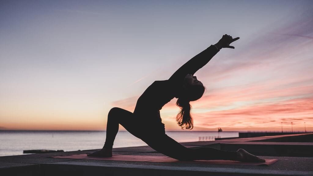 Yoga at the beach - Yoga during Fitness Holidays